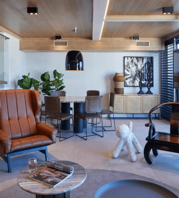 Guest enjoying the view from a Totalstay balcony in Cape Town