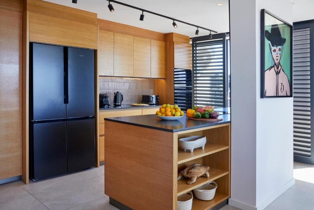 Oak kitchen in a Xenia Signature penthouse